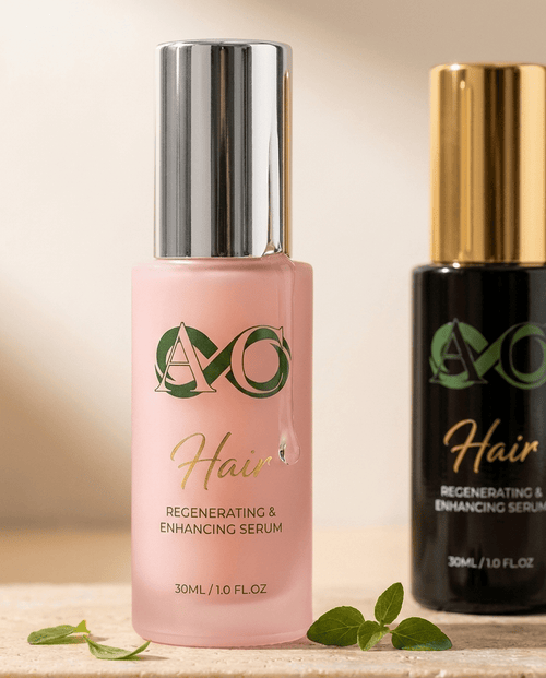 Auraclarify pink hair serum bottle close-up with frosted glass texture, silver chrome cap and serum droplet